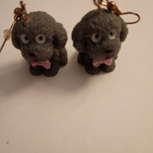 Charming Gray Dog Earrings with Pink Bow